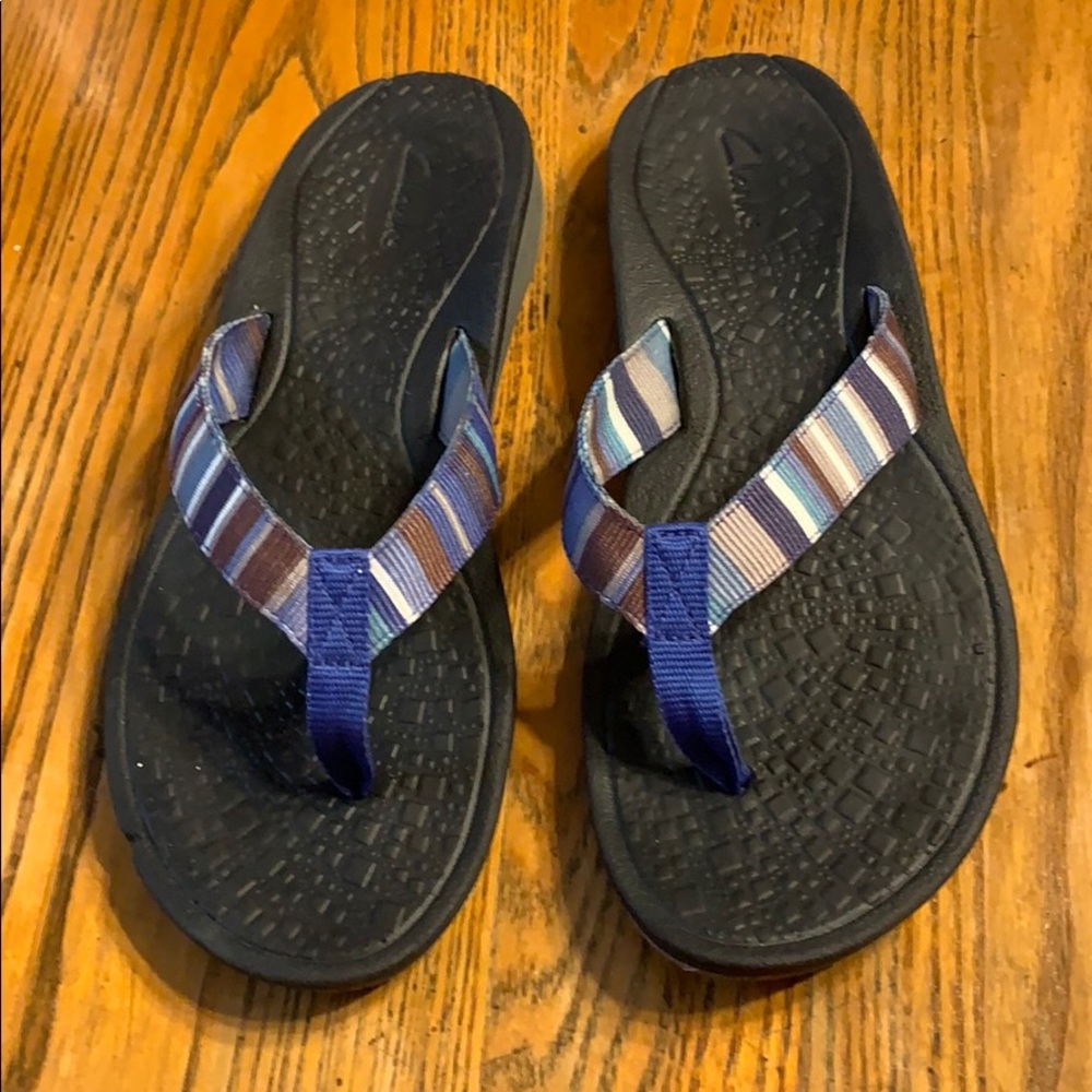 Clark’s flip flops